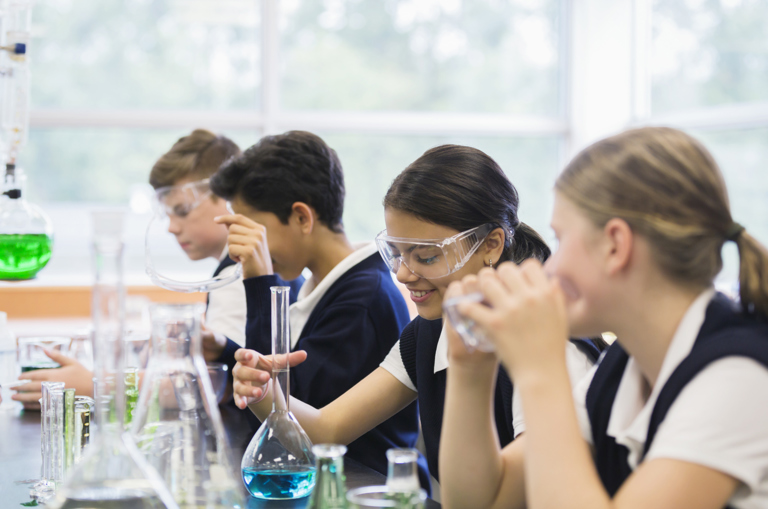 Secondary school students in a chemistry lesson